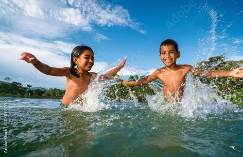young kids having fun in the water