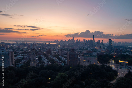 Aerial sunset over NYC from Brooklyn
