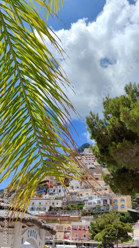Vertical view of Positano village with colorful houses.