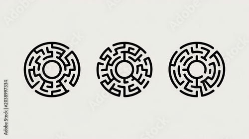 Set of three circular maze icons or labyrinth symbols