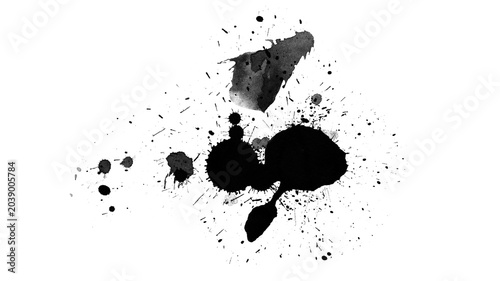 Фотография Black ink blot and gray paint marks with scattered splashes on clean white abstr
