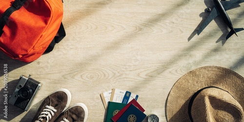 Travel Essentials Flat Lay with Adventure Planning Concept