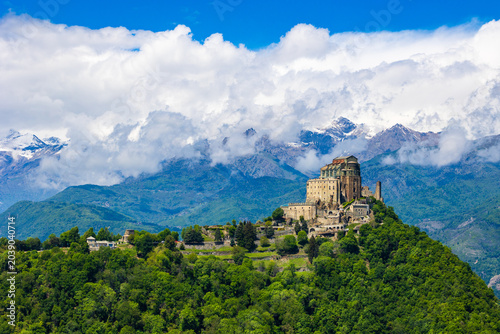 Schilderij op canvas Sacra di San Michele abbey perched on Mount Pirchiriano at the entrance of the S