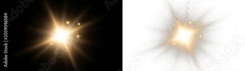 Fotografía bright golden light flare with starburst effect on black background