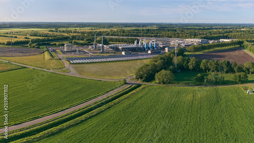 Aerial view of the primary natural gas storage facility from the NAM joint venture near Norg surrounded by solar panels and green fields Langelo, Drenthe, Netherlands.