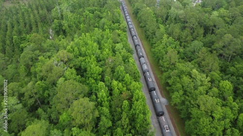 Train going through Florida wilderness drone view
