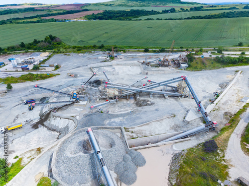 Картината върху платно Mining complex with extensive conveyors and settling ponds visible