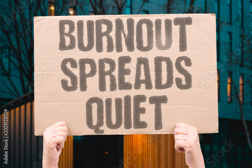 Fotografía "Burnout spreads quiet" Exhaustion transfers between coworkers unnoticed