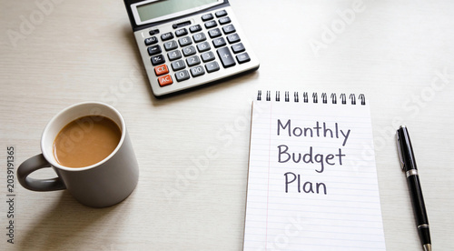 Monthly Budget Plan Notebook with Calculator and Coffee Cup