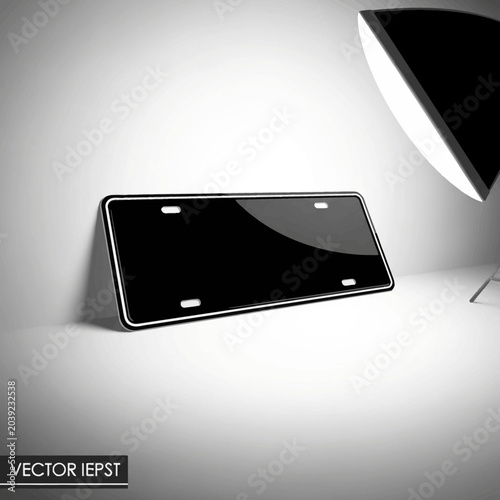 Black smartphone on white surface.