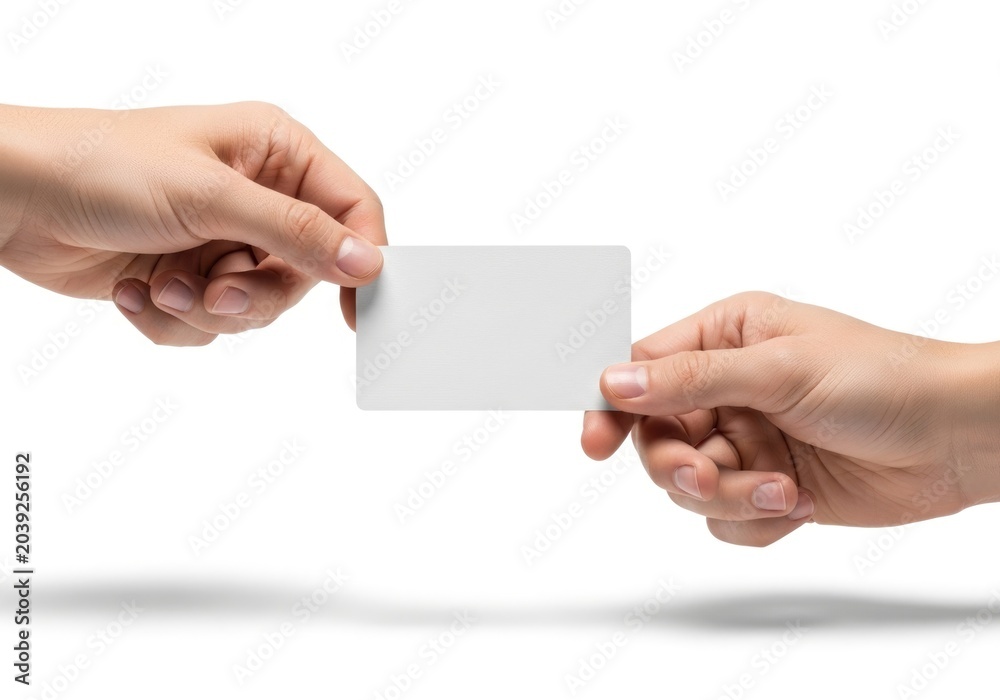 Fototapeta premium Hands exchanging blank business card.