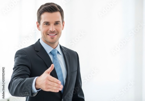 Businessman Extending Hand for Shaking.