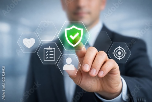 Insurance protection interface touch by businessman.
