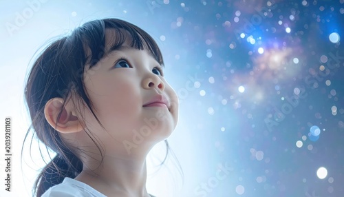 Little girl looking up at stars.