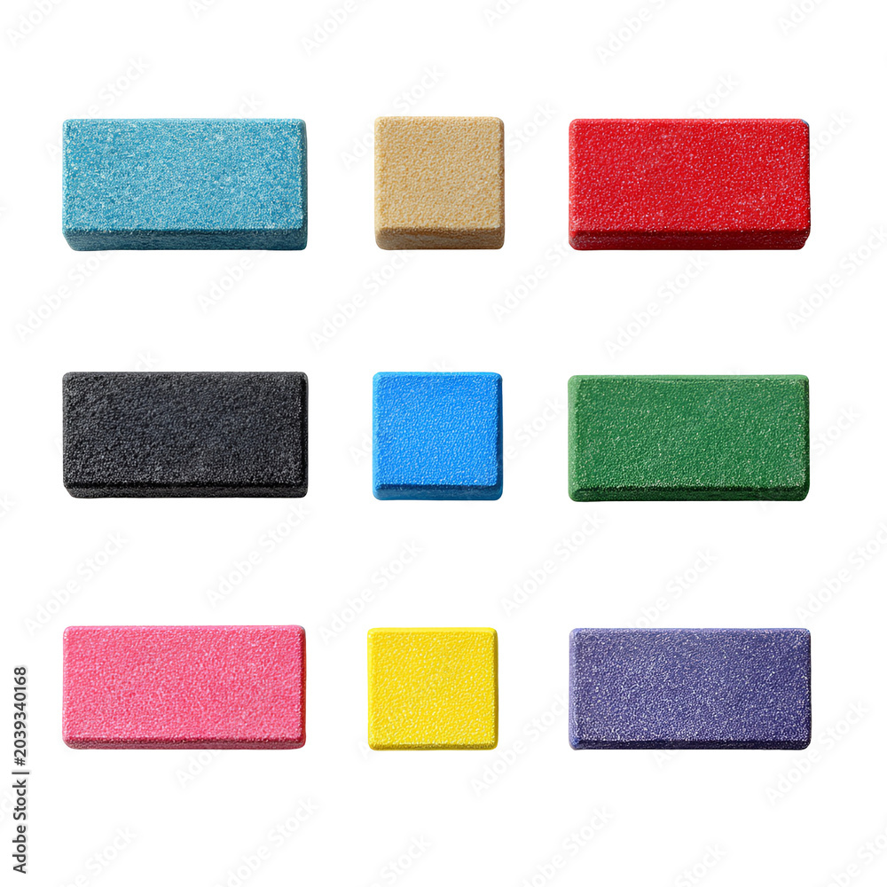Fototapeta premium Colorful pastel sponge blocks arranged in grid pattern on white background