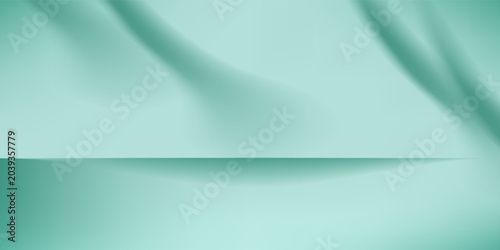 Fotografia Empty turquoise and teal studio background with soft spotlight