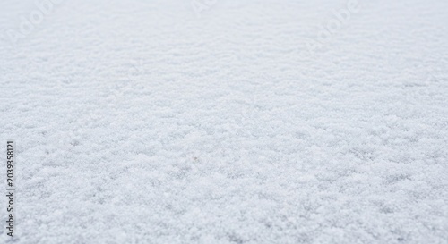 Snow Field Textured with Natural Patterns in Winter