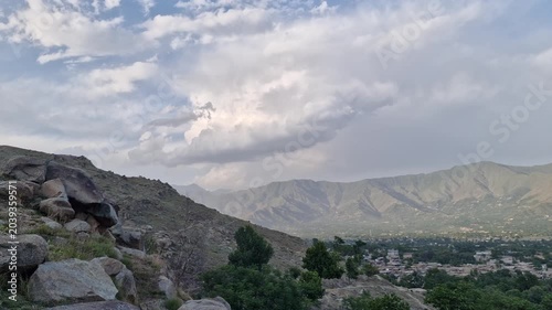 Hyperlapse or timelapse of Moving white Clouds Across a Bright Blue Sky Background