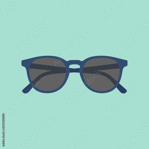 A pair of dark blue sunglasses isolated on a light background