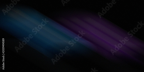 Bild auf Leinwand Soft blurred light trails with blue and purple hues moving across dark background creating mysterious dreamlike visual effect