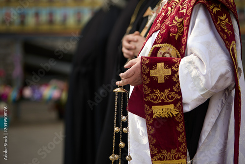 Foto Clergy in black religious vestments