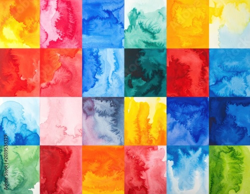 A vibrant grid of watercolor paint splatters and washes in various bright colors.
