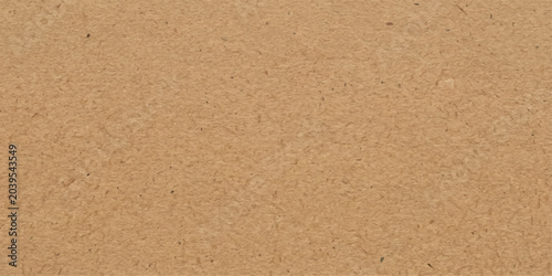 Quadro em tela A close-up macro shot of a sandy beach textured surface, showcasing the granular details and warm, earthy tones of the natural material