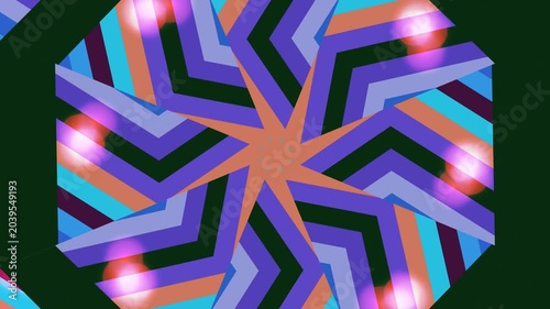 Vibrant geometric patterns form a starburst on a dark background