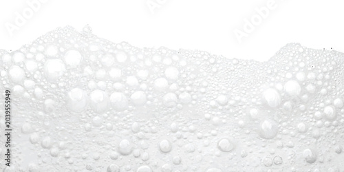 Fotografie White soap foam bubbles texture with liquid lather