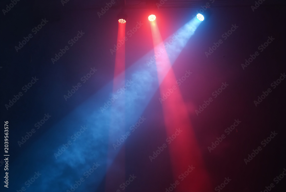 Obraz premium Converging Laser Beams in Fog