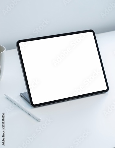 Blank tablet mockup on clean white desk