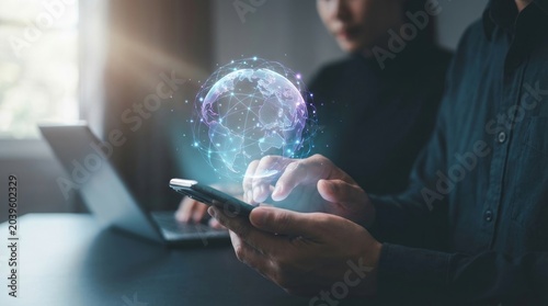 Person holding smartphone with holographic globe, symbolizing global connectivity and digital communication