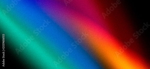 Black grainy backdrop with blue green orange glowing gradient. Dark abstract background with noisy texture