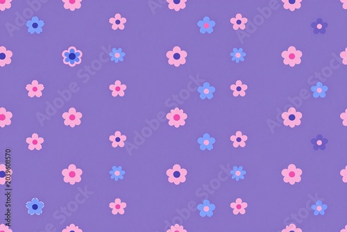 A purple background with pink and blue flowers