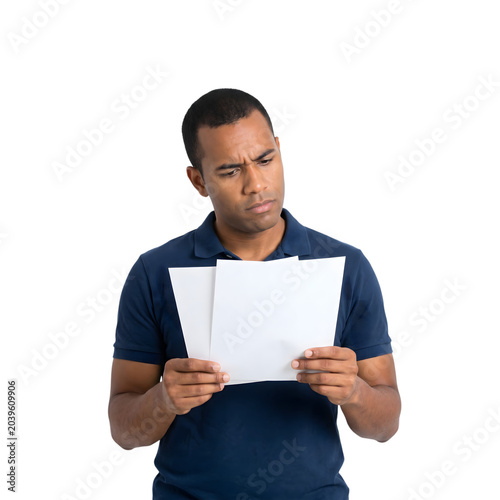 Confused man looking at blank papers isolated on transparent background