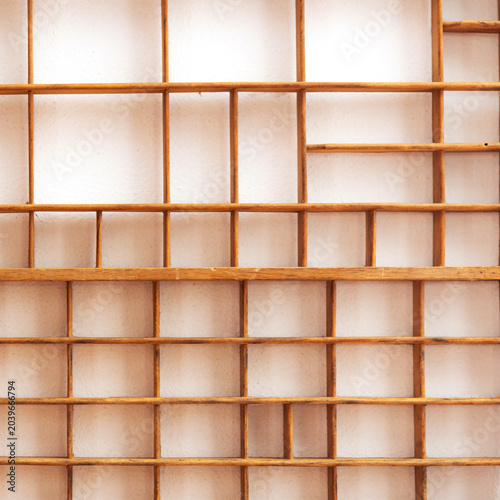 Detail of old and wooden grid