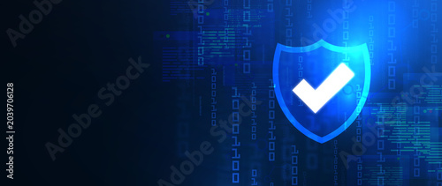 Secure Digital Shield: A luminous blue shield with a white checkmark symbolizes digital security and data protection against cyber threats, set against a dark background with digital code.