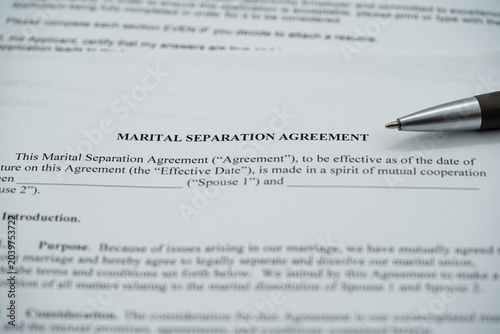 Obraz na płótnie Close up of marital separation agreement document with pen on legal contract