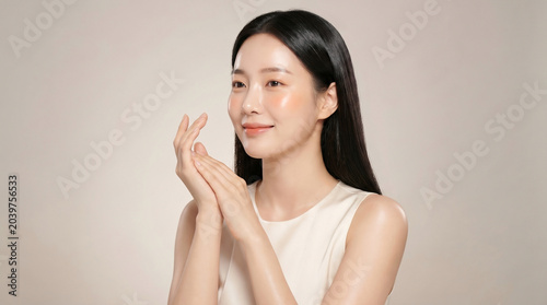 Studio beauty portrait of an elegant woman with radiant skin