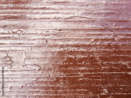 Textured brown surface with gloss in abstract style  