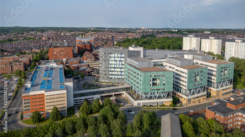 Photos Leeds General Infirmary in Leeds, West Yorkshire, England, aerial view of the major NHS hospital, medical buildings and surrounding Leeds city centre skyline