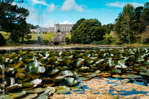 Canvas Print Beautiful landscape of Powerscourt House and gardens with pond and waterlilies