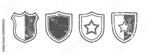 Obraz na płótnie Four distressed grey shield emblems with varied badge crest heraldry