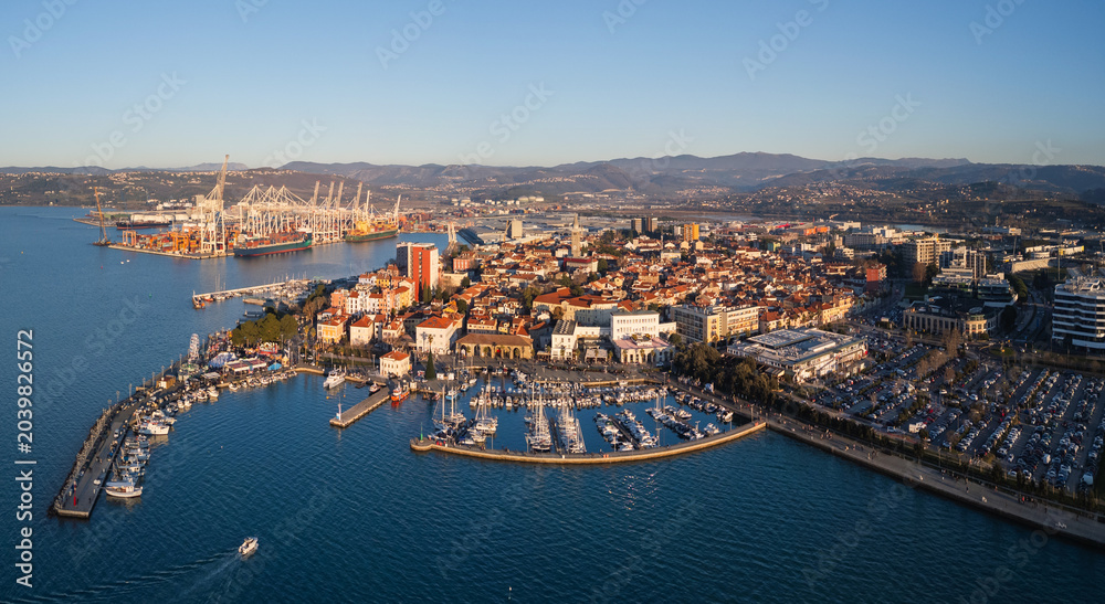 Obraz premium Aerial view of Koper, Slovenia showing the marina, waterfront, and urban landscape by the Adriatic Sea in a popular travel destination.