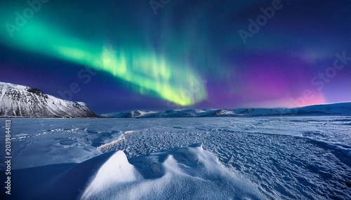 purple blue green aurora borealis polar lights over ice and snow landscape