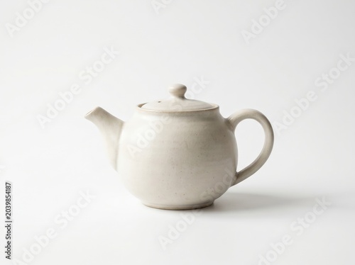 Elegant White Ceramic Teapot on Neutral Background for Home and Kitchen Decor