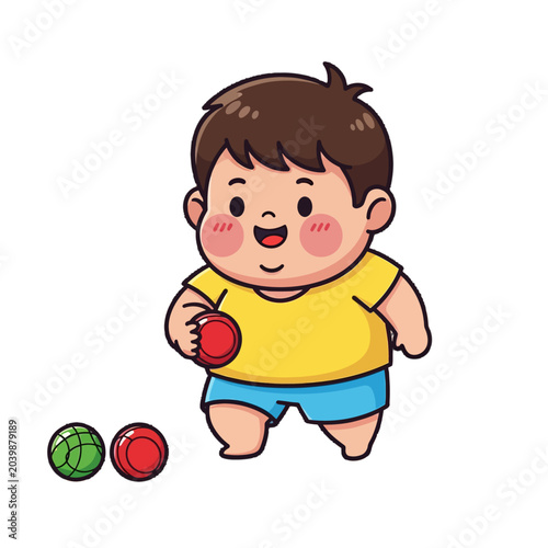 Happy toddler boy playing with colorful balls indoors.