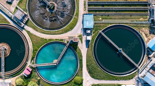Wastewater treatment facility with multiple tanks located in a clean environment during daytime