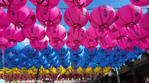 Low Angle View of Traditional Festive Lantern Canopy Under a Clear Blue Sky