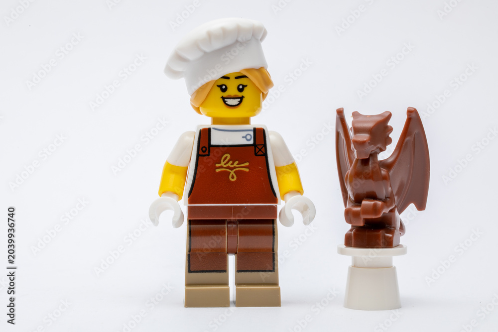 Obraz premium A minifigure of a chocolatier making a chocolate dragon